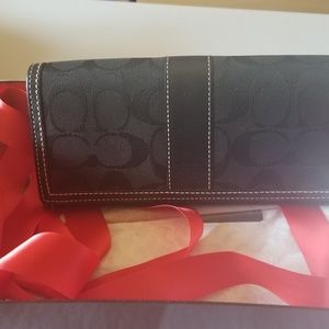 Black leather and fabric Coach Signature wallet